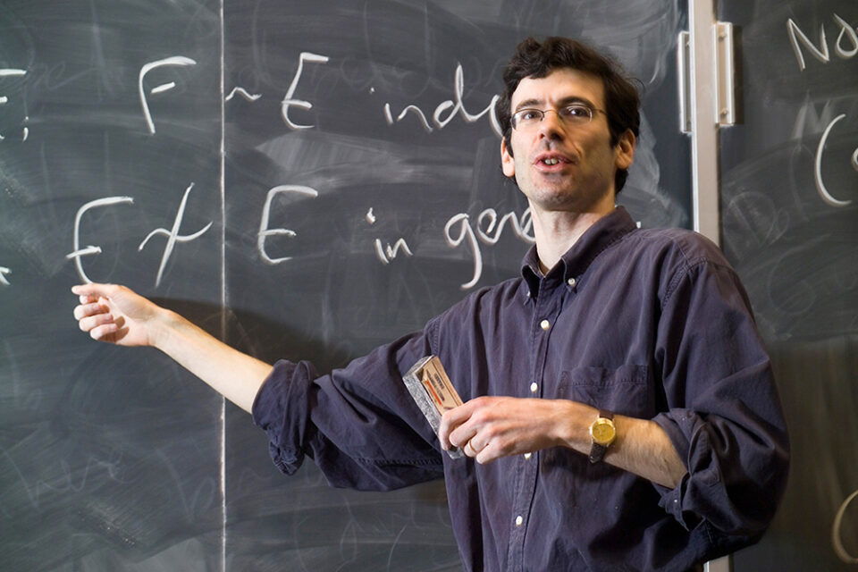 Notable Alumni - Jon Kleinberg, professor of computer science (COMS), teaching a class.